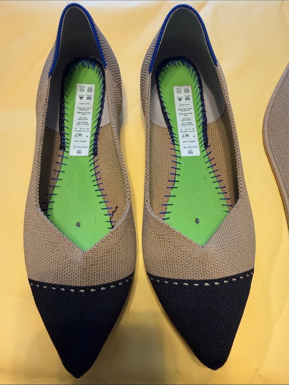 Rothy’s Pointed Toe Two-Tone Knit Flats in Tan and Black